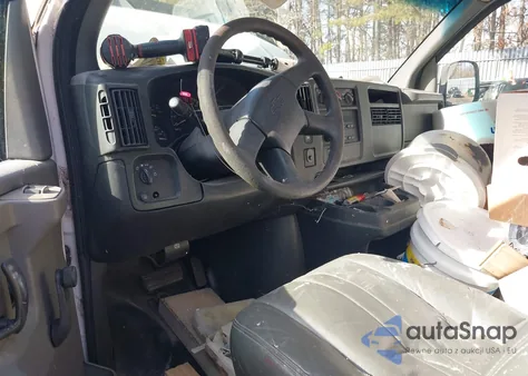 2003 Chevrolet Express from USA, damaged, VIN 1GCFH25T031128321